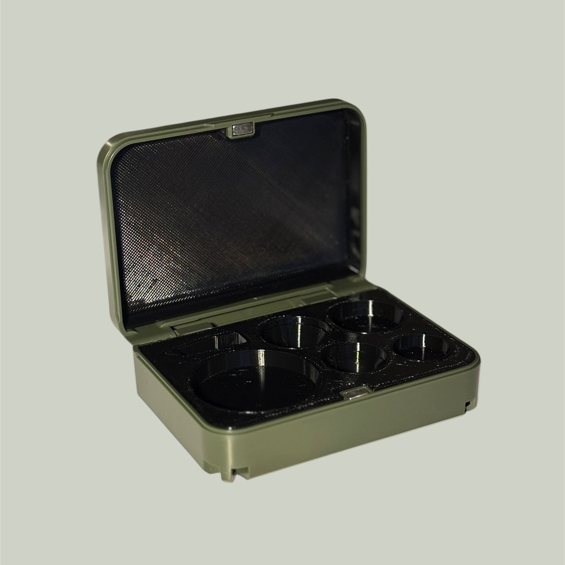 Custom Volk lens case with green exterior and black interior for ophthalmologists and optometrists