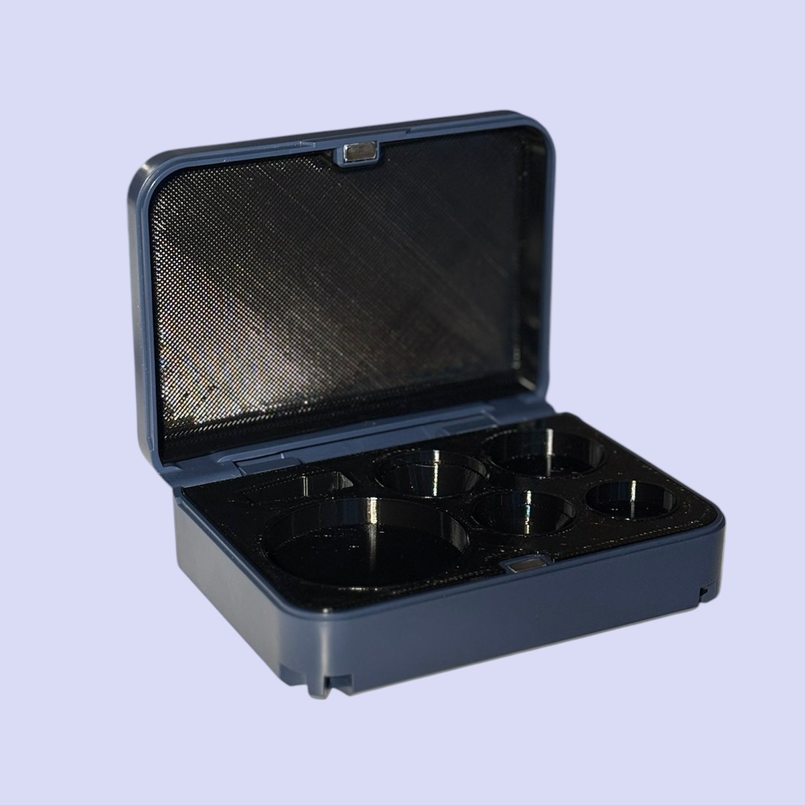 Custom Volk lens case with navy exterior and black interior for ophthalmologists and optometrists