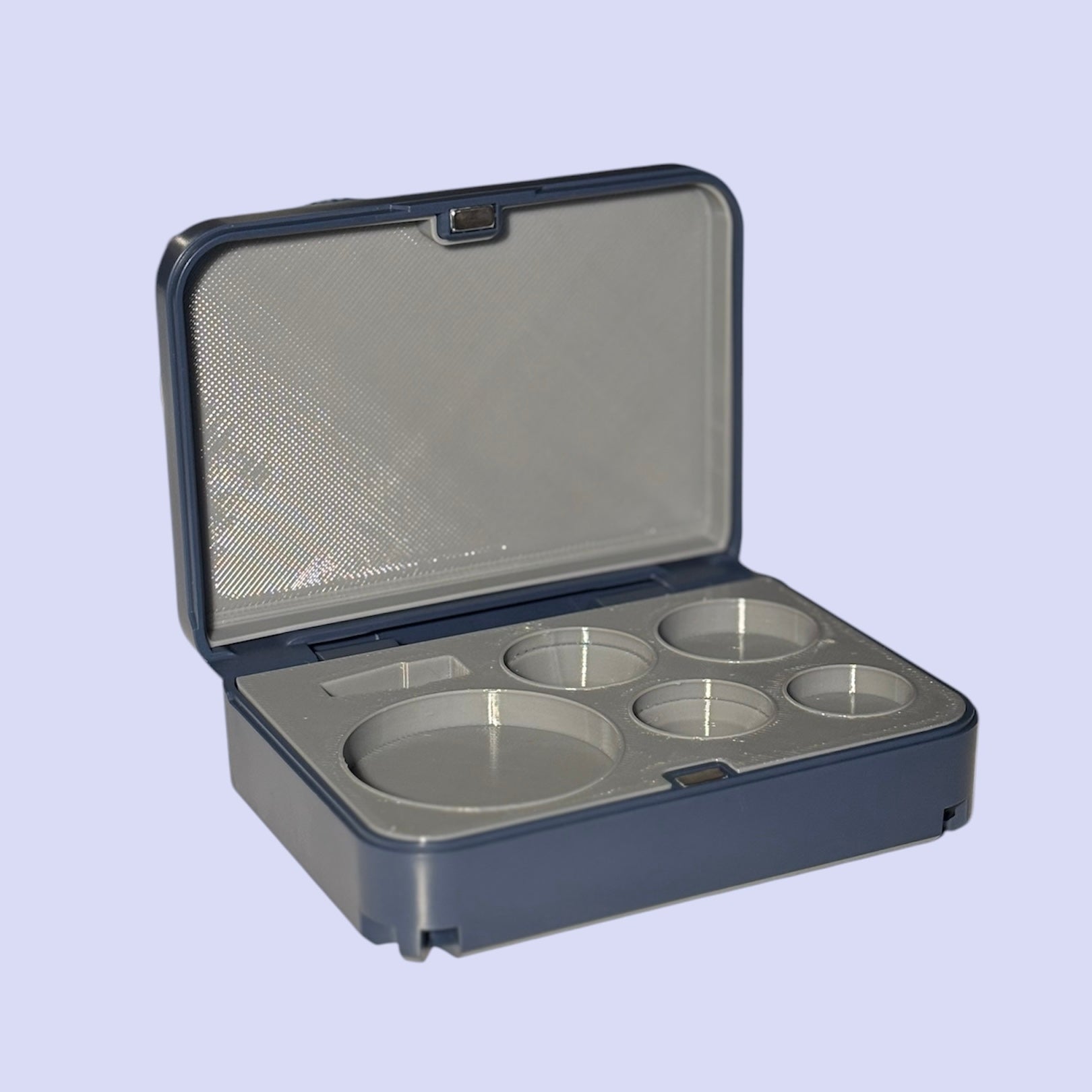 Custom Volk lens case with navy exterior and gray interior for ophthalmologists and optometrists